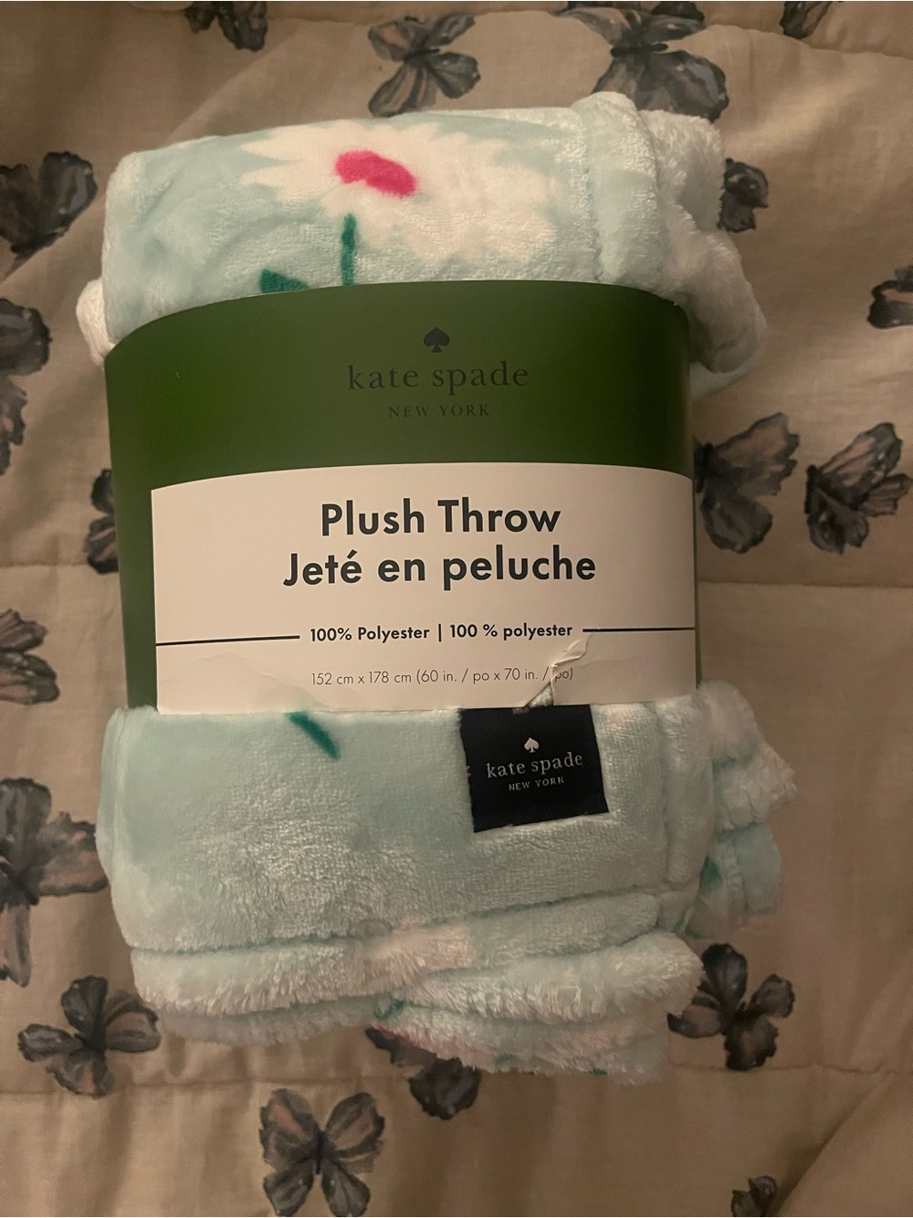 kate spade mint green and white plush throw with floral design